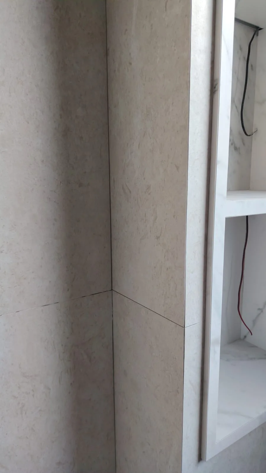 Tiled feature niche under construction